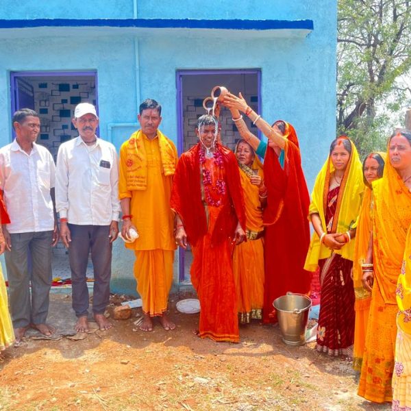 Enthused by the construction of community toilets, the villagers welcomed the head of the Panchayat