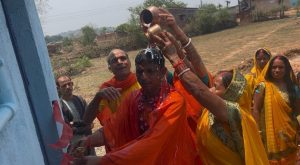 Enthused by the construction of community toilets, the villagers welcomed the head of the Panchayat