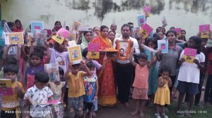 LJP leader Ranjan Paswan distributed notebooks and pens among the children.